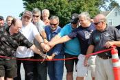 Ribbon cutting splashed